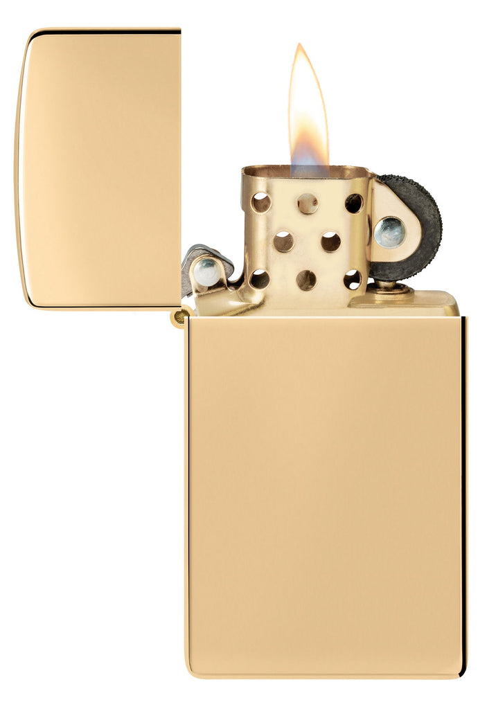 Slim® High Polish Brass Finish Windproof Lighter with its lid open and lit