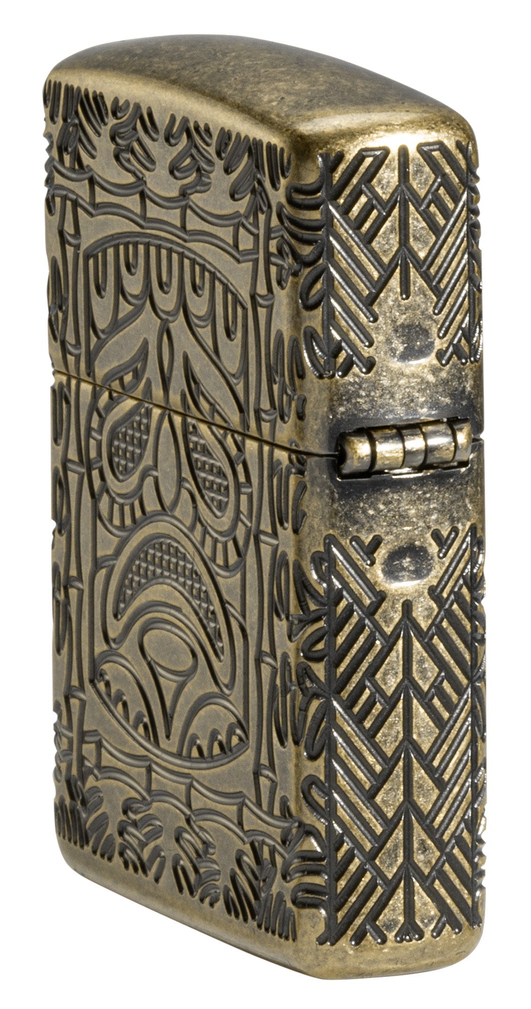Tiki Design ArmorÂ® Antique Brass Windproof Lighter standing at an angle, showing the back and hinge side of the lighter.
