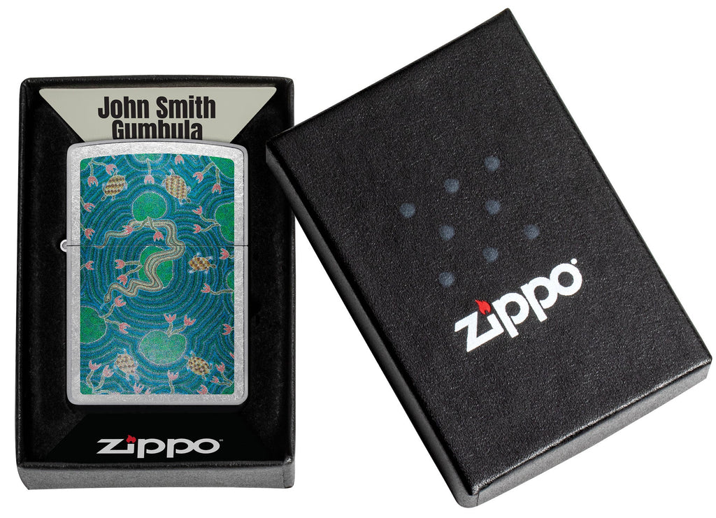 Zippo John Smith Gumbula Snake & Turple Design Street Chrome Windproof Lighter in its packaging.