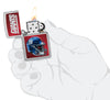 NFL New York Giants Helmet Street Chrome Windproof Lighter lit in hand.