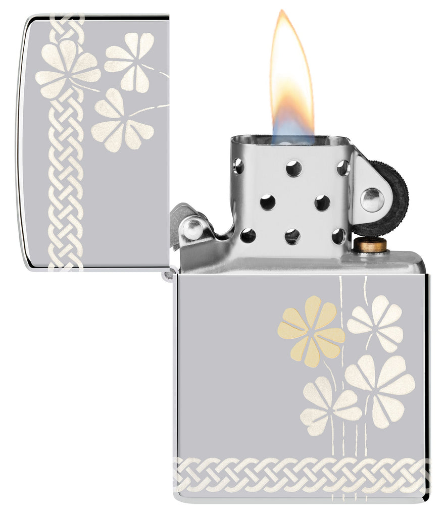 Zippo Laser 360° Clover Design High Polish Chrome Pocket Lighter with its lid open and lit.