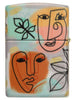Abstract Faces Design 540 Color Windproof Lighter with its lid open and unlit.