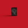 Glamour shot of Zippo Harley-Davidson Laser Fancy Fill High Polish Black Windproof Lighter standing in a red scene.