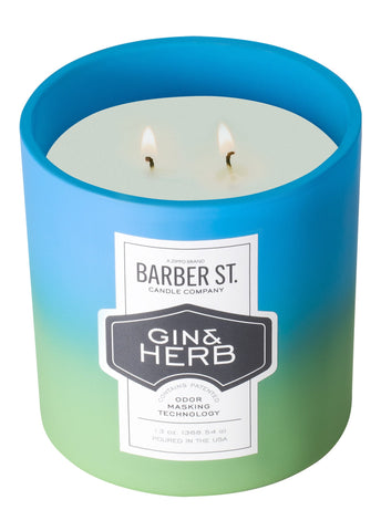 Front of Zippo Barber Street Gin Herb Odor Masking Candle, lit