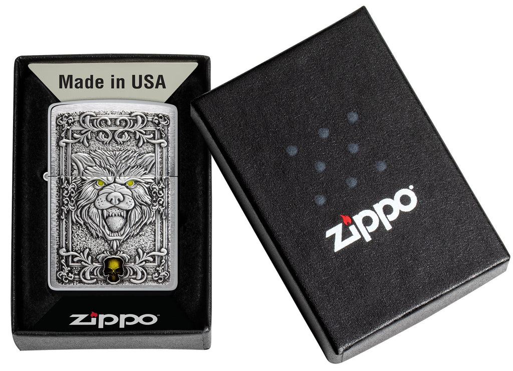 Zippo Wolf Emblem Design Brushed Chrome Windproof Lighter in its packaging.