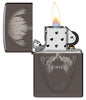 Screaming Monster Design Photo Image Black Ice® Windproof Lighter with its lid open and lit.