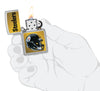 NFL Pittsburgh Steelers Helmet Street Chrome Windproof Lighter lit in hand.