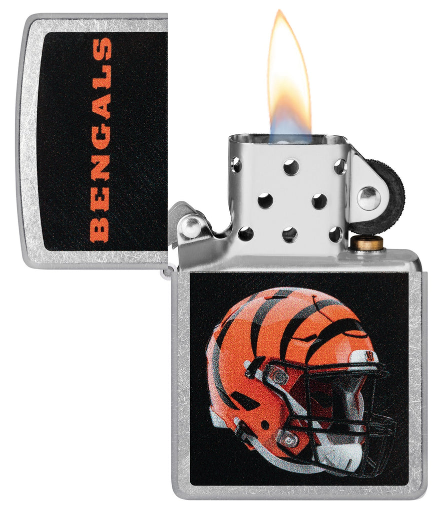NFL Cincinnati Bengals Helmet Street Chrome Windproof Lighter with its lid open and lit.
