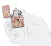 Floral Woman Design Rose Gold Windproof Lighter lit in hand