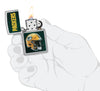 NFL Green Bay Packers Helmet Street Chrome Windproof Lighter lit in hand.