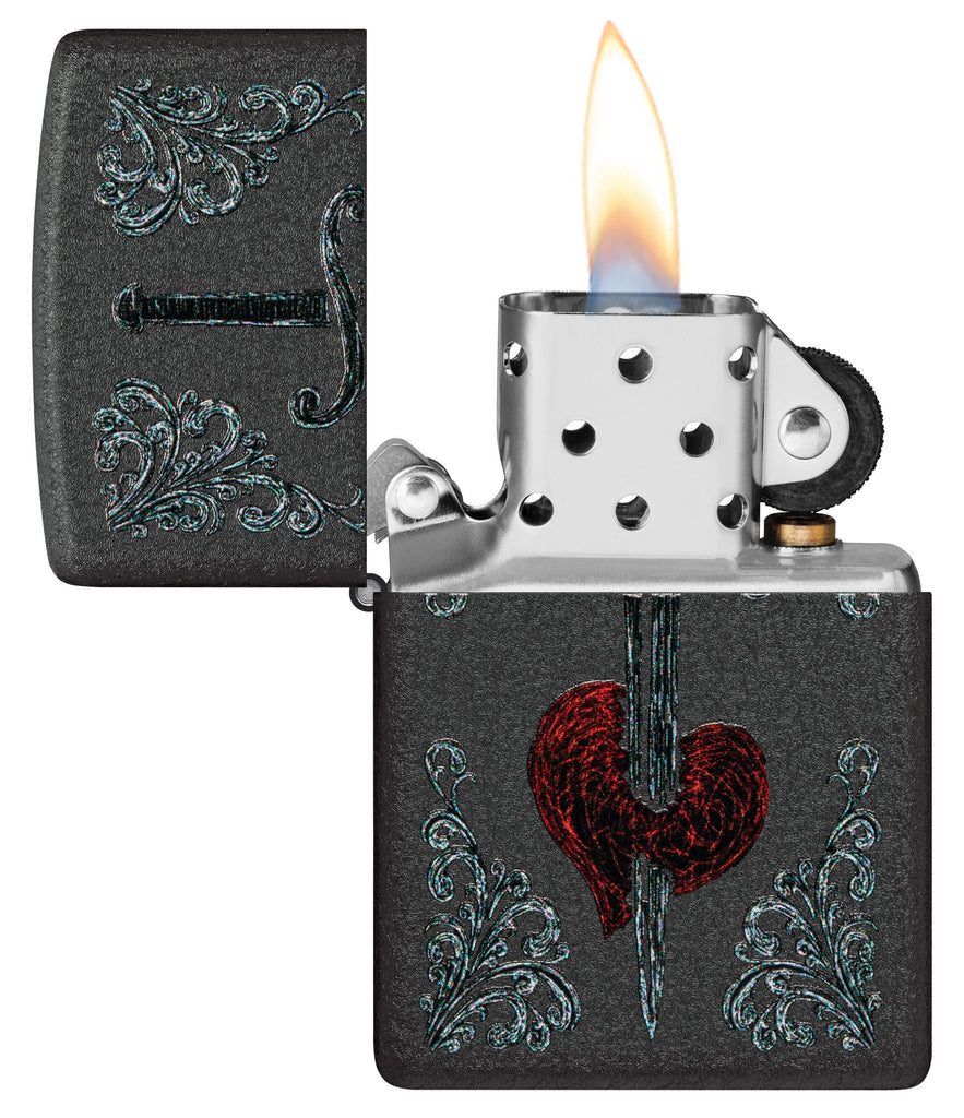 Zippo Heart Dagger Tattoo Design Black Crackle Windproof Lighter with its lid open and lit.