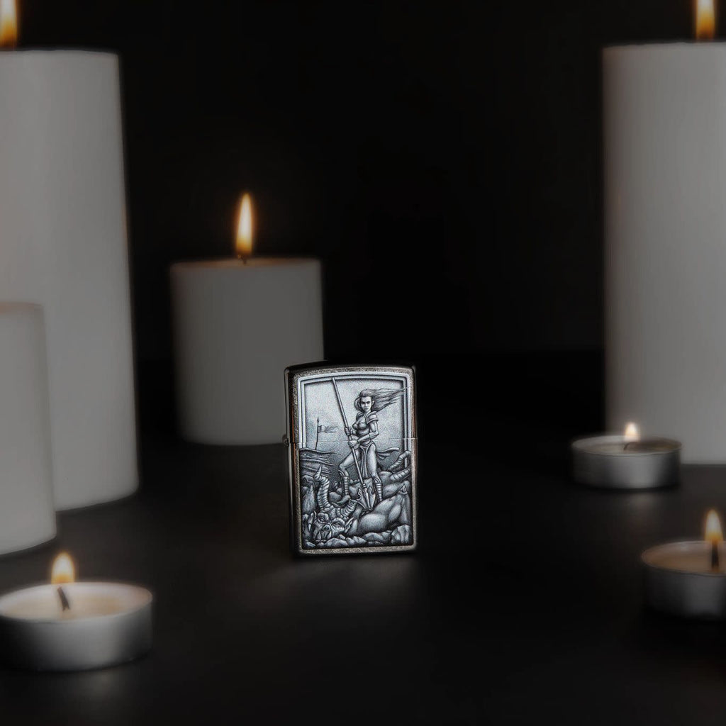 Lifestyle image of Medieval Wonman Warrior Street Chrome Windproof Lighter standing with lit candles.
