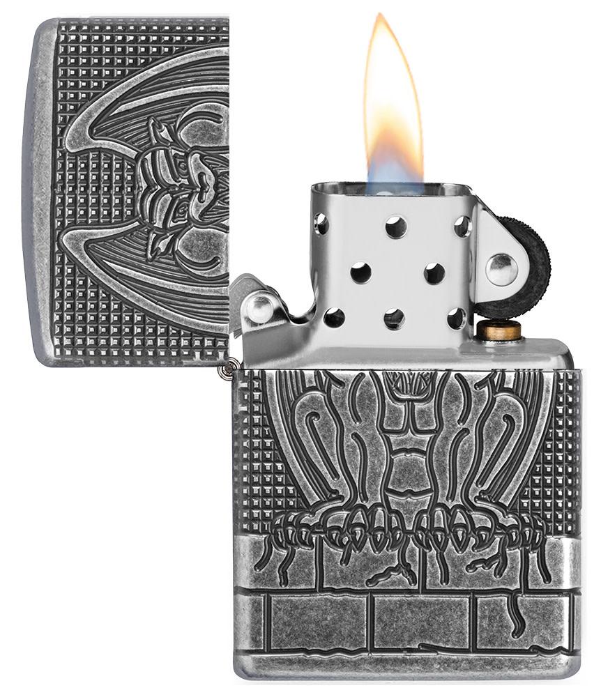 Armor® Antique Silver Gargoyle Windproof Lighter with its lid open and lit