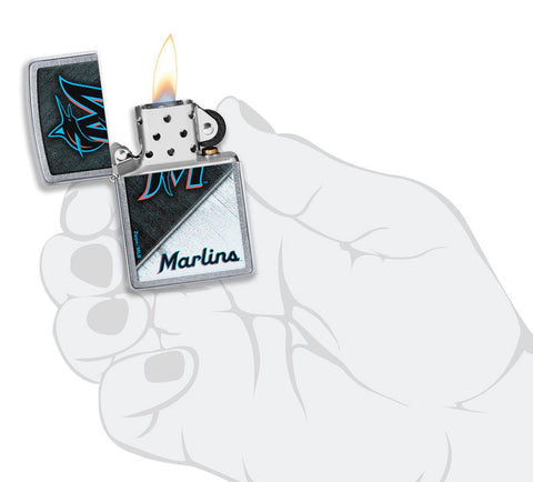 MLB® Miami Marlins™ Street Chrome™ Windproof Lighter lit in hand.