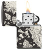 Laser 360° Pirates Treasure Design High Polish Black Windproof Lighter with its lid open and lit.