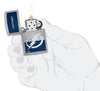 NHL® Tampa Bay Lightning Street Chrome™ Windproof Lighter lit in hand