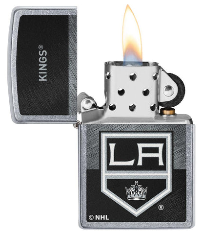 NHL® LA Kings Street Chrome™ Windproof Lighter with its lid open and lit
