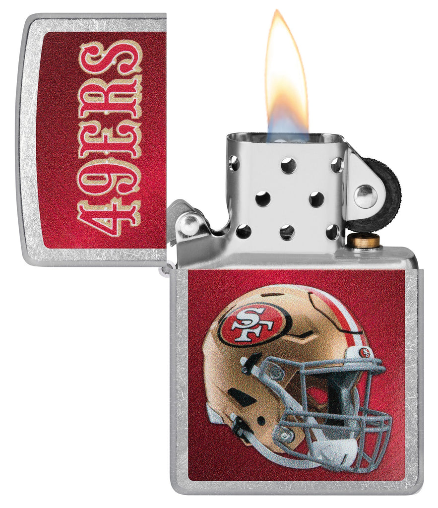 NFL San Francisco 49ers Helmet Street Chrome Windproof Lighter with its lid open and lit.