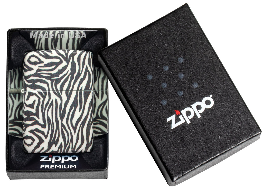 Zebra Print Design 540 Color Windproof Lighter in it's packaging.