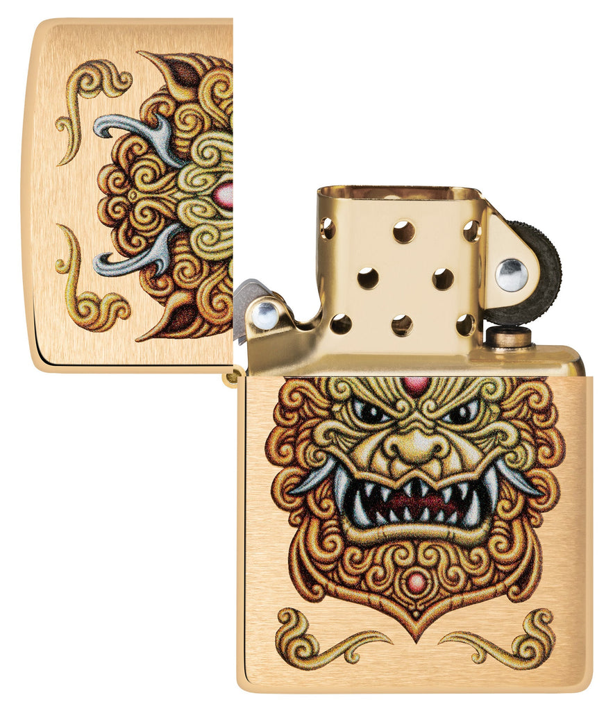 Zippo Foo Dog Design Brushed Brass Windproof Lighter with its lid open and unlit.
