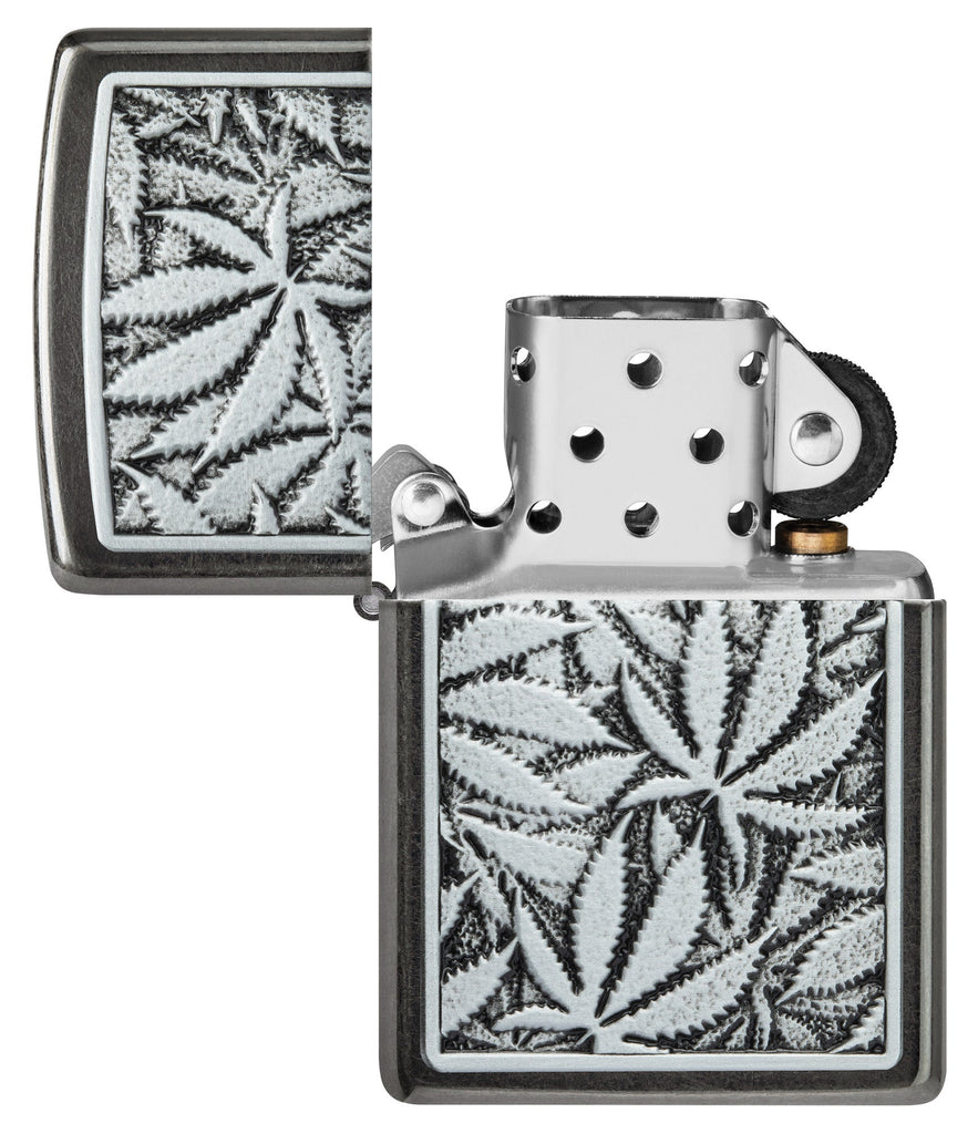Cannabis Emblem Design Grey Windproof Lighter with its lid open and unlit.