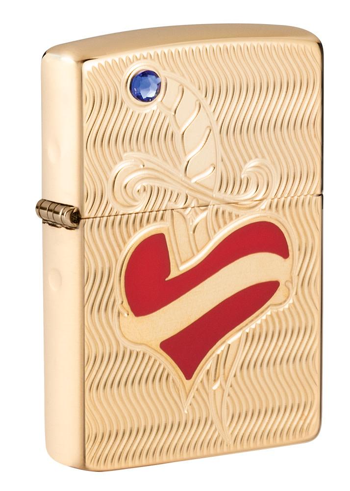 Front shot of Heart and Sword Design High Polish Brass Windproof Lighter standing at a 3/4 angle