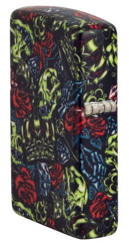 Skull Crown Glow-In-The-Dark 540 Color Windproof Lighter standing at an angle, showing the back and hinge side of the lighter.