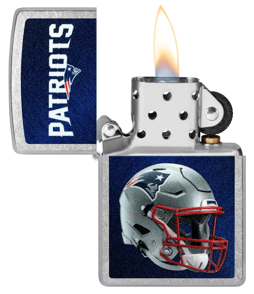 NFL New England Patriots Helmet Street Chrome Windproof Lighter with its lid open and lit.