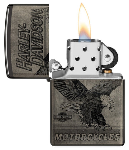 Harley-Davidson Eagle Photo Image 360° High Polish Black Windproof Lighter with its lid open and lit.