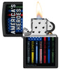 Zippo Buckwear America's Heroes Design Black Matte Windproof Lighter with its lid open and lit.