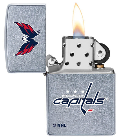 NHL Washington Capitals Street Chrome™ Windproof Lighter with its lid open and lit