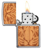 WOODCHUCK USA Cherry Tiger Head Emblem Windproof Lighter with its lid open and lit.