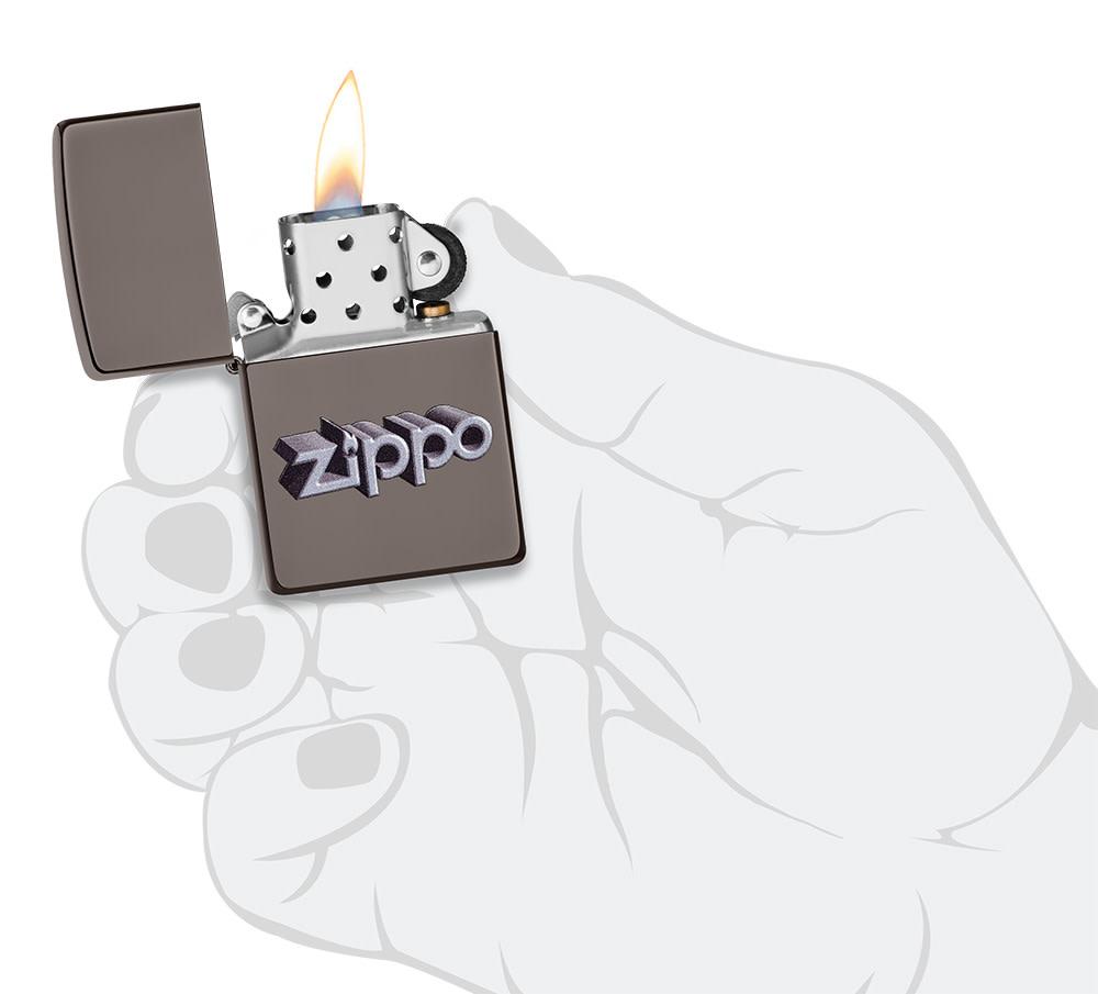 Zippo 3D Logo Design Black IceÂ® Windproof Lighter lit in hand