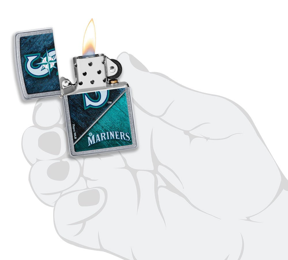 MLB™ Seattle Mariners™ Street Chrome™ Windproof Lighter lit in hand.