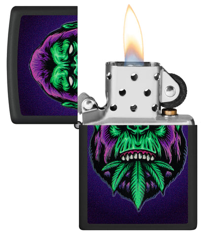 Zippo Black Light Cannabis Gorilla Design Black Matte Windproof Lighter  with its lid open and lit.