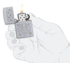 Painted Floral Satin Chrome Windproof Lighter lit in hand