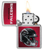 NFL Atlanta Falcons Helmet Street Chrome Windproof Lighter with its lid open and lit.