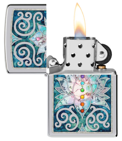 Zippo Fusion Lotus Flower Design High Polish Chrome Windproof Lighter with its lid open and lit.