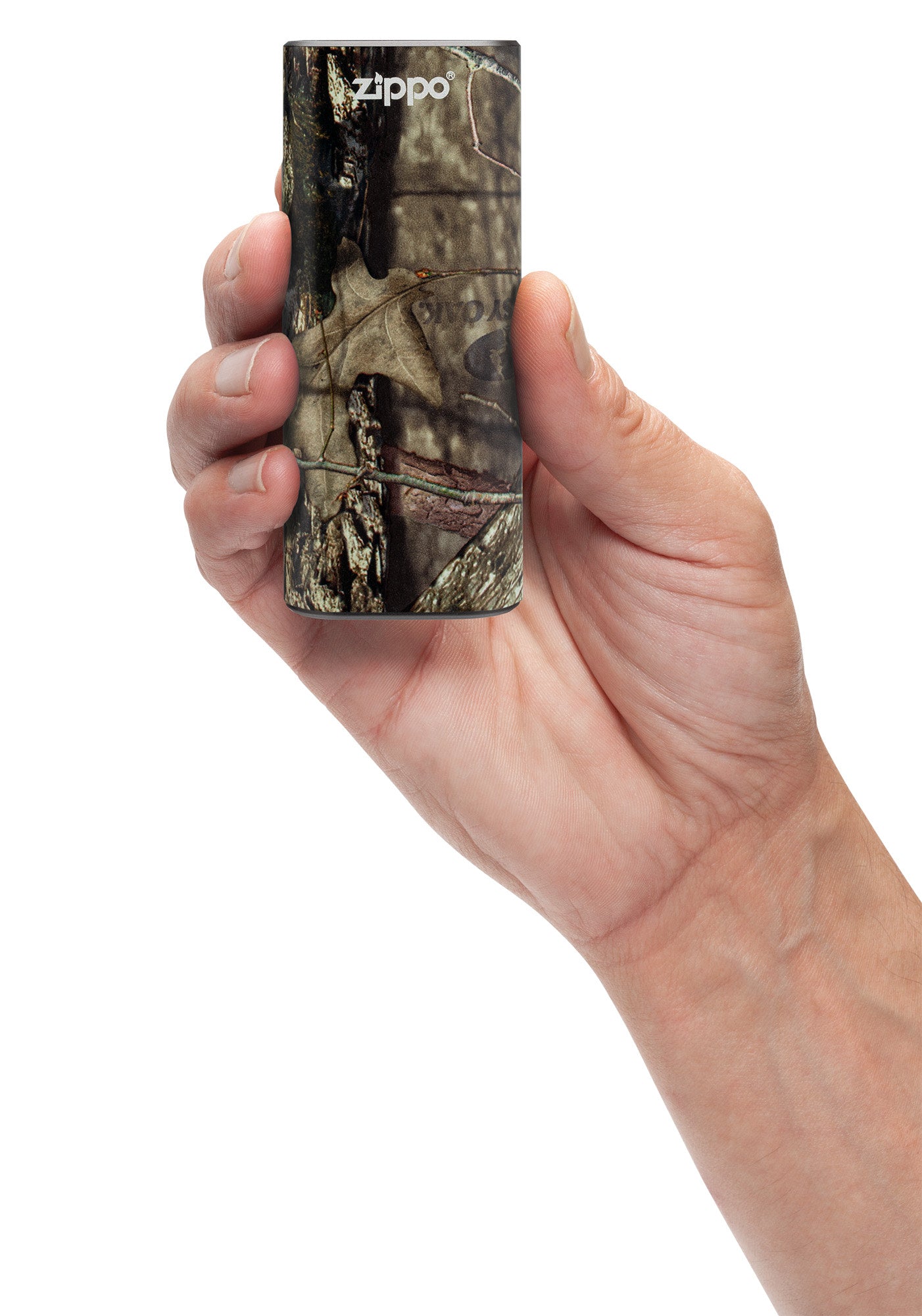 Mossy OakÂ® Break-Up CountryÂ® HeatBankÂ® 6 Rechargeable Hand Warmer in hand.