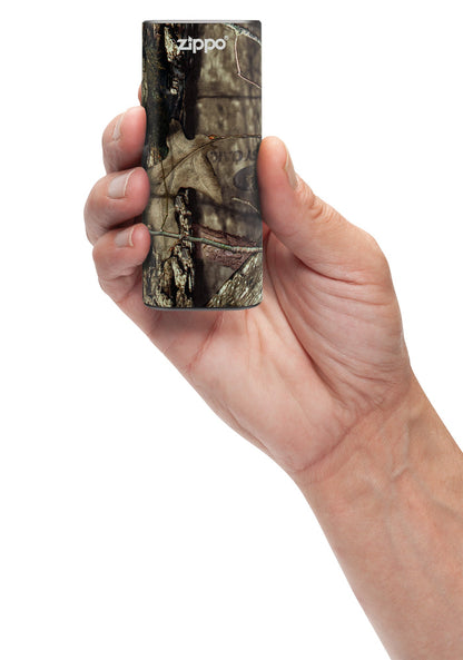 Mossy OakÂ® Break-Up CountryÂ® HeatBankÂ® 6 Rechargeable Hand Warmer in hand.