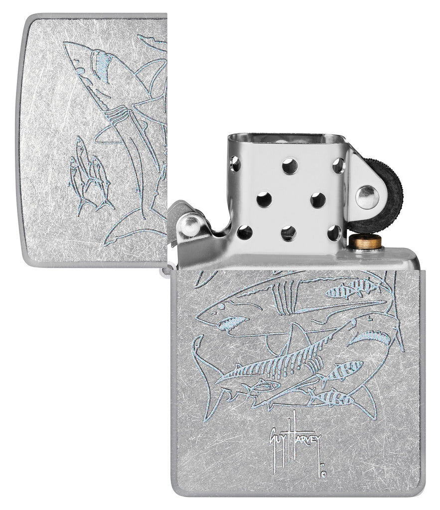Zippo Guy Harvey Shark Design Street Chomre Windproof Lighter with its lid open and unlit.
