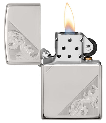 Sterling Silver Diagonal Filigree Design Windproof Lighter with its lid open and lit