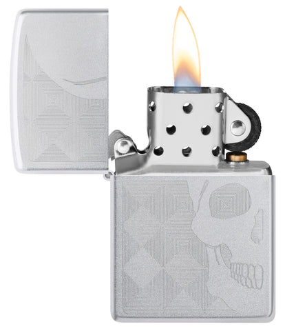 Skull Design Auto Engraved Satin Chrome Windproof Lighter with its lid open and lit.