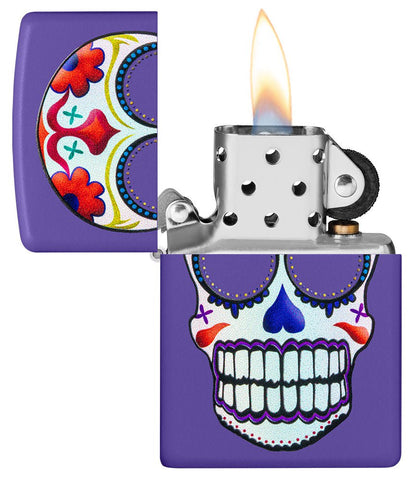 Sugar Skull Design Purple Matte Windproof Lighter with its lid open and lit.