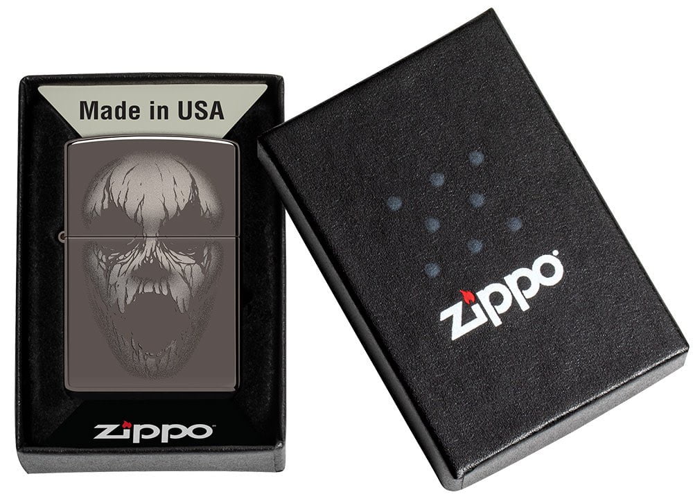 Screaming Monster Design Photo Image Black Ice® Windproof Lighter in its packaging.