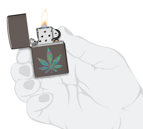 Zippo Funky Cannabis Design Black Ice Windproof Lighter lit in hand.