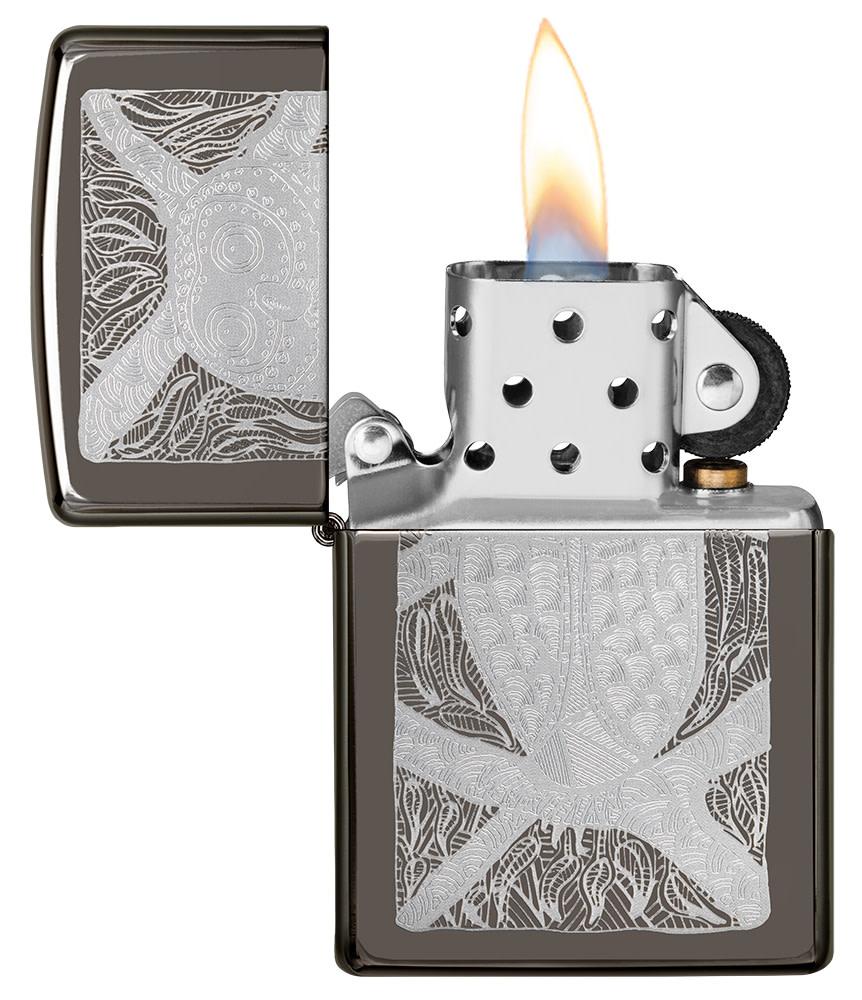 John Smith Gumbula Owl Black IceÂ® Windproof Lighter with its lid open and lit
