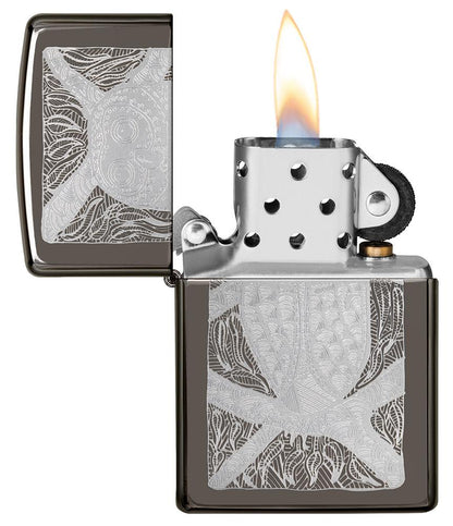 John Smith Gumbula Owl Black IceÂ® Windproof Lighter with its lid open and lit