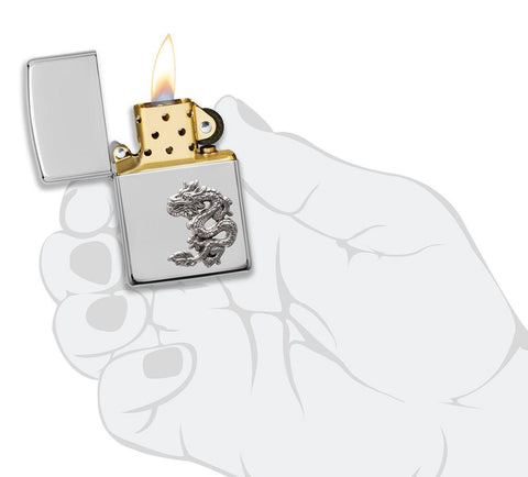 Armor® Chinese Dragon Sterling Silver Emblem Windproof Lighter lit in hand.