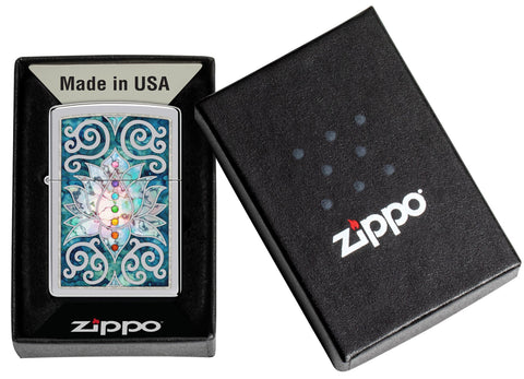 Zippo Fusion Lotus Flower Design High Polish Chrome Windproof Lighter in its packaging.